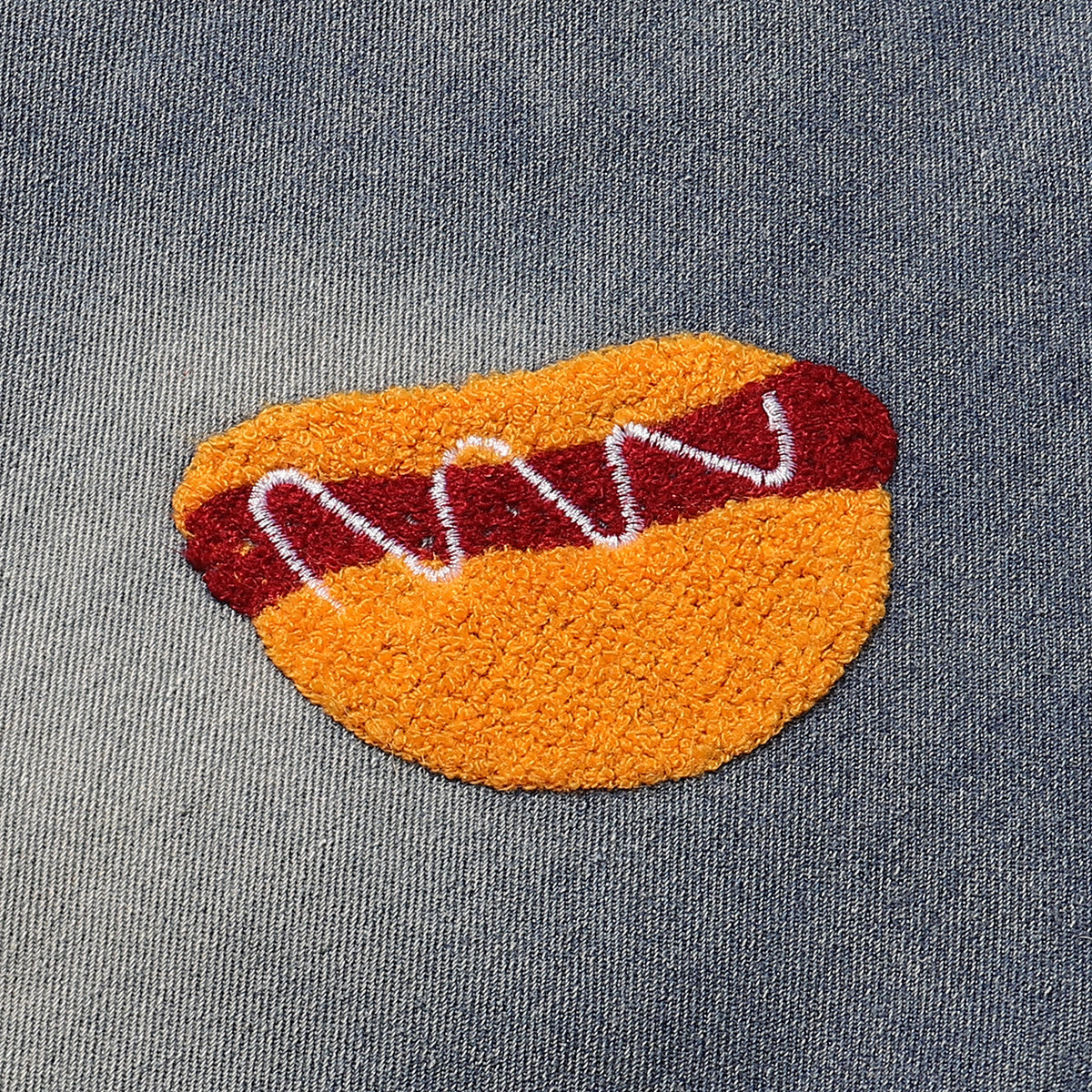 Bermudas vaqueras rasgadas con parches de camuflaje