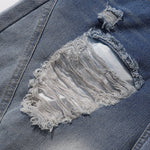 Bermudas vaqueras rasgadas con parches de camuflaje