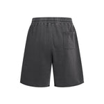 Pantalones cortos deportivos con bordes sin rematar y lavados a la piedra