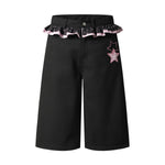 Bermudas de mezclilla desgastada con estampado de salpicaduras