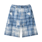 Bermudas vaqueras rasgadas con parches de camuflaje