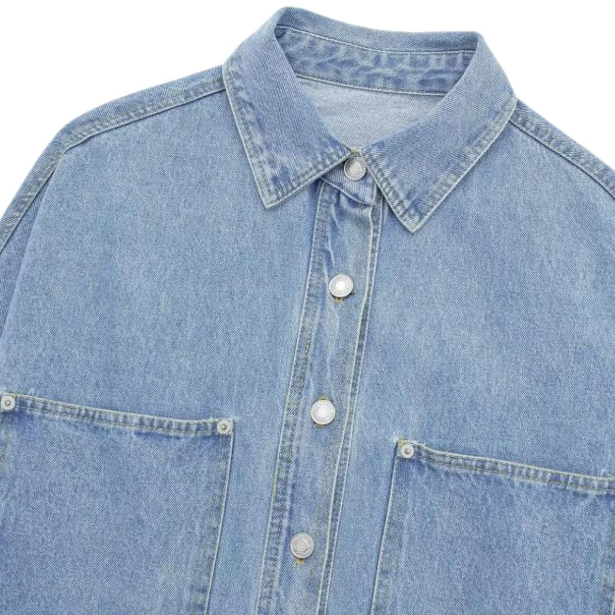 Vestido midi vaquero sin mangas con botones y aberturas en la parte delantera