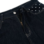 Star‑Print Curved Blade Raw Denim Jeans