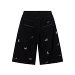 Bermudas vaqueras rasgadas con parches de camuflaje