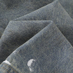 Bermudas con lavado vintage y salpicaduras de tinta