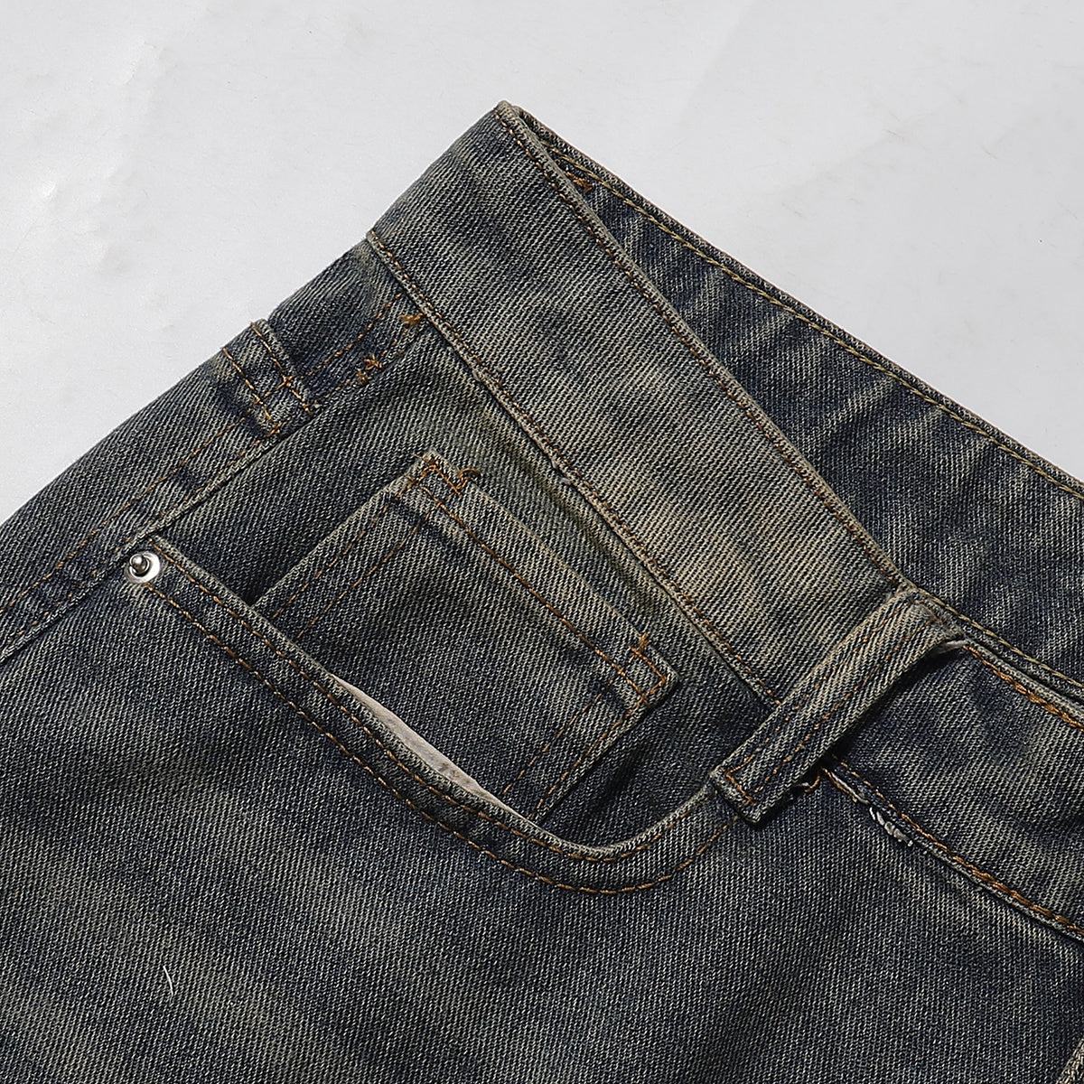 Bermudas vaqueras rasgadas con parches de camuflaje