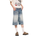Bermudas con lavado vintage y salpicaduras de tinta