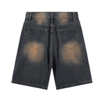 Bermudas vaqueras rasgadas con parches de camuflaje