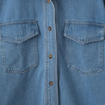 Vestido midi vaquero sin mangas con botones y aberturas en la parte delantera