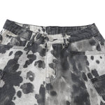 Bermudas de mezclilla desgastada con estampado de salpicaduras