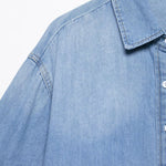 Vestido midi vaquero sin mangas con botones y aberturas en la parte delantera