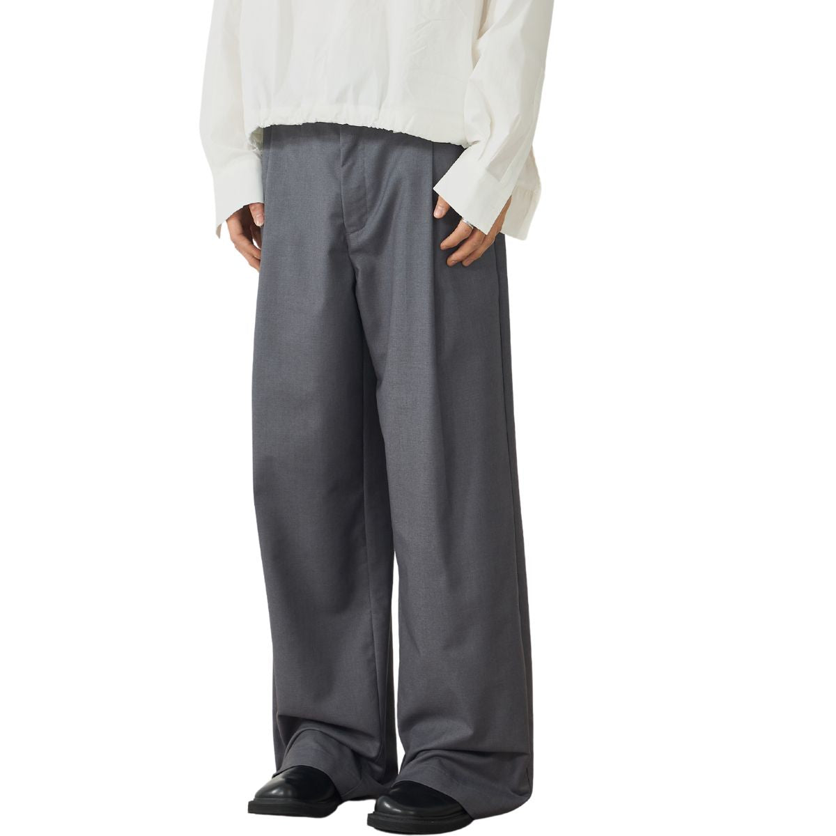 Pantalones anchos plisados