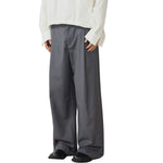 Pantalones anchos plisados