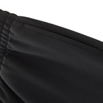 Pantalones deportivos holgados de color gris oscuro