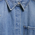 Vestido midi vaquero sin mangas con botones y aberturas en la parte delantera