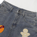 Bermudas vaqueras rasgadas con parches de camuflaje