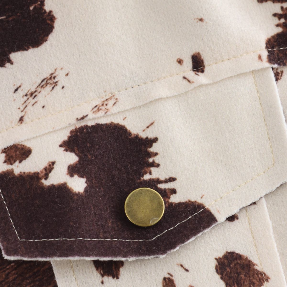 Vestido midi vaquero sin mangas con botones y aberturas en la parte delantera