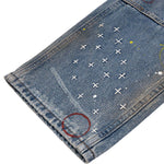 Pantalones vaqueros holgados con estampado de serpiente