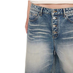 Bermudas con lavado vintage y salpicaduras de tinta