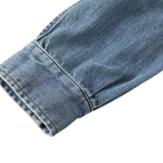 Vestido midi vaquero sin mangas con botones y aberturas en la parte delantera