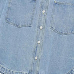 Vestido midi vaquero sin mangas con botones y aberturas en la parte delantera