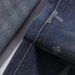 Cross Print Wide Leg Denim Jeans
