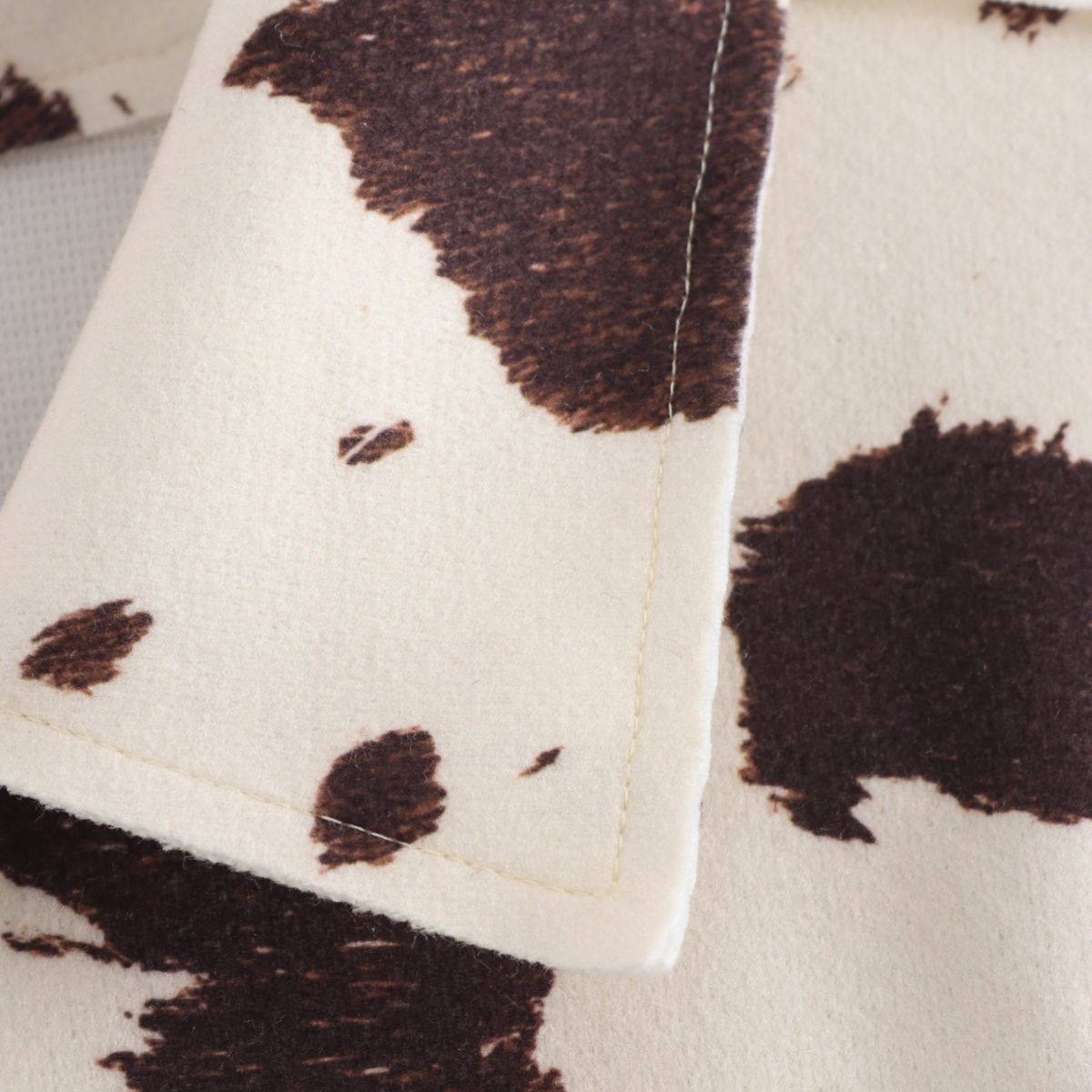 Vestido midi vaquero sin mangas con botones y aberturas en la parte delantera