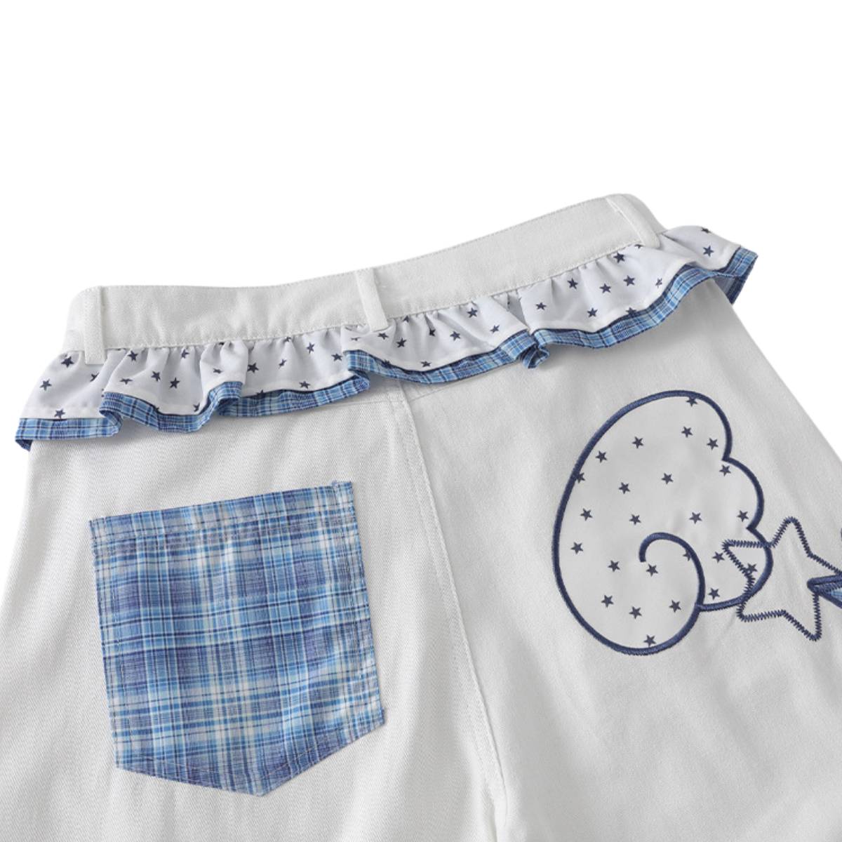 Bermudas de mezclilla desgastada con estampado de salpicaduras