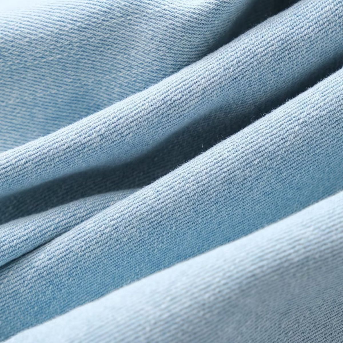 Vestido midi vaquero sin mangas con botones y aberturas en la parte delantera