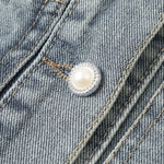 Shorts vaqueros con mariposas bordadas y adornados con perlas