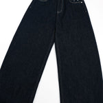 Star‑Print Curved Blade Raw Denim Jeans
