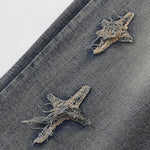 Distressed Patched Star Detail Jeans