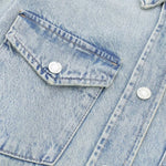 Vestido midi vaquero sin mangas con botones y aberturas en la parte delantera