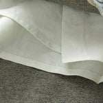 Falda vaquera con bordado de perlas y lavado vintage