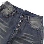 Bermudas con lavado vintage y salpicaduras de tinta