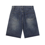 Bermudas vaqueras rasgadas con parches de camuflaje