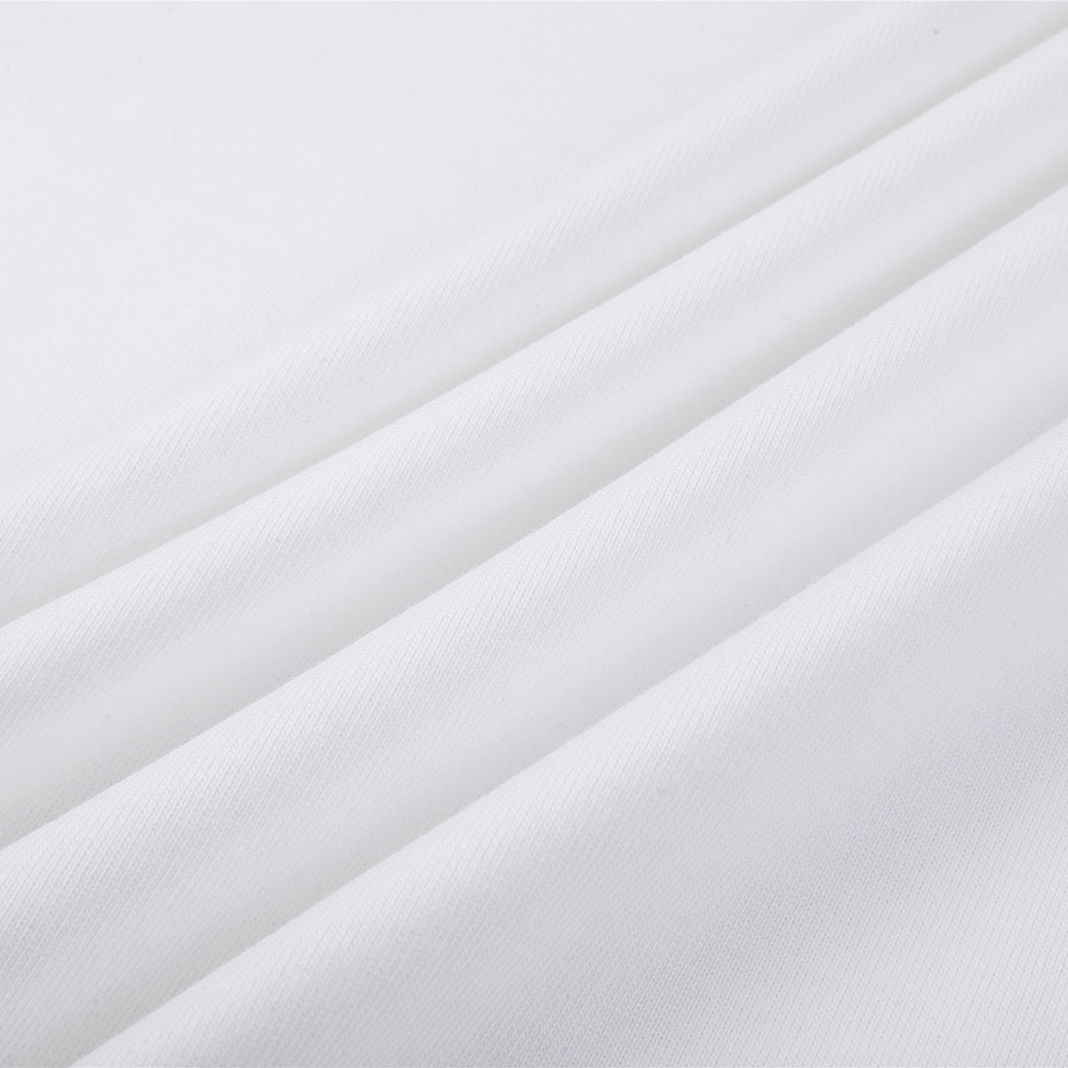 Camiseta de algodón de color liso y corte relajado de 6,6 oz