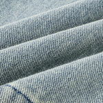 Falda vaquera con bordado de perlas y lavado vintage