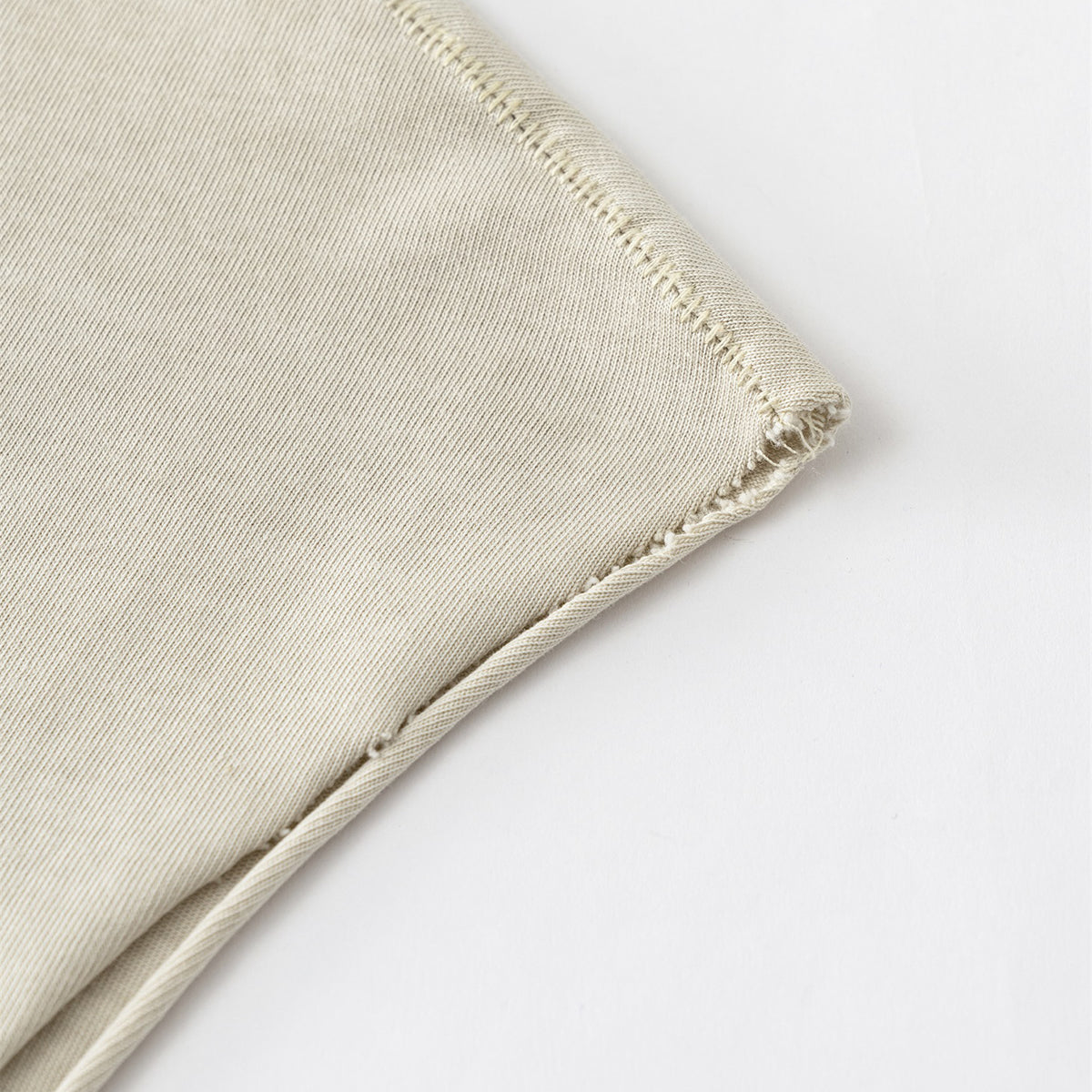 Camiseta sin mangas con borde reverso sin rematar de 8 oz