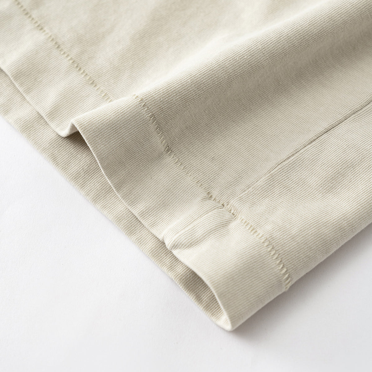 Camiseta sin mangas con borde reverso sin rematar de 8 oz