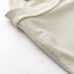 Camiseta sin mangas con borde reverso sin rematar de 8 oz