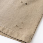 Pantalones cortos desgastados y descoloridos