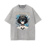 Camiseta con estampado de mariposas lavadas a la piedra