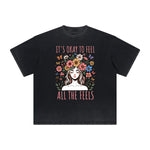 Camiseta vintage con estampado floral deshilachado