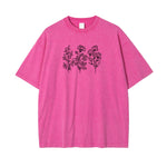 Camiseta de algodón rosa con diseño de líneas florales