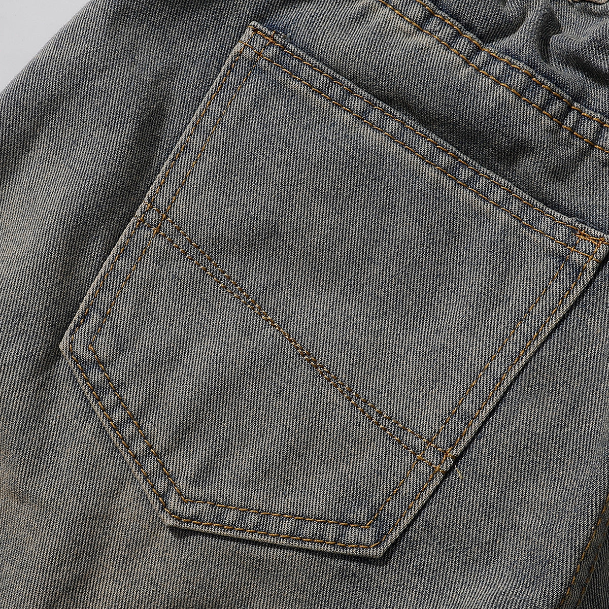 Bermudas vaqueras rasgadas con parches de camuflaje