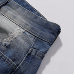 Bermudas vaqueras rasgadas con parches de camuflaje