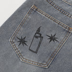 Bermudas vaqueras rasgadas con parches de camuflaje