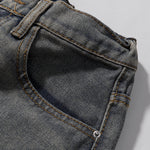 Bermudas vaqueras rasgadas con parches de camuflaje