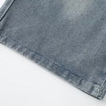 Bermudas vaqueras rasgadas con parches de camuflaje